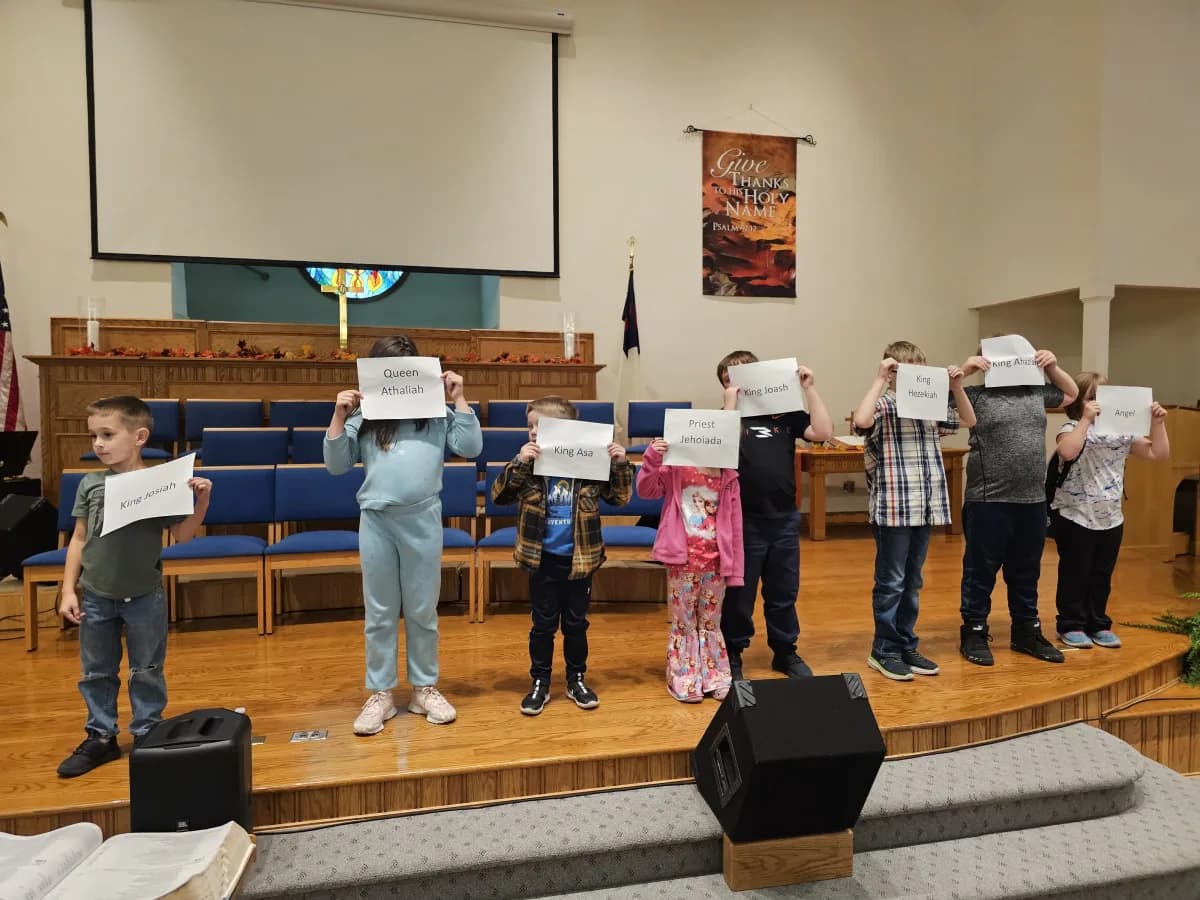 Students presenting Bible characters during chapel service at First Baptist Church of Elkins